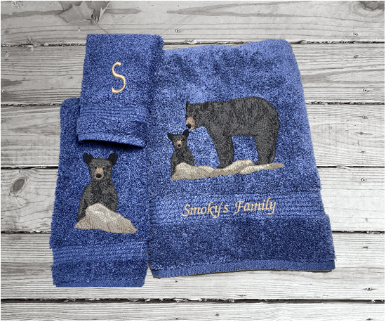 Blue bath towel set or individual towels, embroidered bear design the perfect design for the outdoor living family. This Luxury theme towel set of 3 towels 1 bath towel 27" x 50", 1 hand towel 16" x 27", 1 wash cloth 13" x 13". You can personalize the towel set with a name and an initial on the washcloth or just designs. Borgmanns Creations - 1