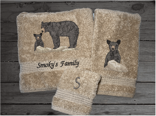 Beige bath towel set or individual towels, embroidered bear design the perfect design for the outdoor living family. This Luxury theme towel set of 3 towels 1 bath towel 27" x 50", 1 hand towel 16" x 27", 1 wash cloth 13" x 13". You can personalize the towel set with a name and name on the washcloth or just designs. Borgmanns Creations -1