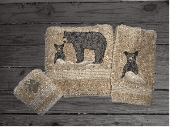 Beige bath towel set or individual towels, embroidered bear design the perfect design for the outdoor living family. This Luxury theme towel set of 3 towels 1 bath towel 27" x 50", 1 hand towel 16" x 27", 1 wash cloth 13" x 13". You can personalize the towel set with a name and name on the washcloth or just designs. Borgmanns Creations -2