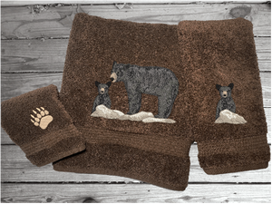 Brown bath towel set or individual towels, embroidered bear design the perfect design for the outdoor living family. This Luxury theme towel set of 3 towels 1 bath towel 27" x 50", 1 hand towel 16" x 27", 1 wash cloth 13" x 13". You can personalize the towel set with a name and name on the washcloth or just designs. Borgmanns Creations 2