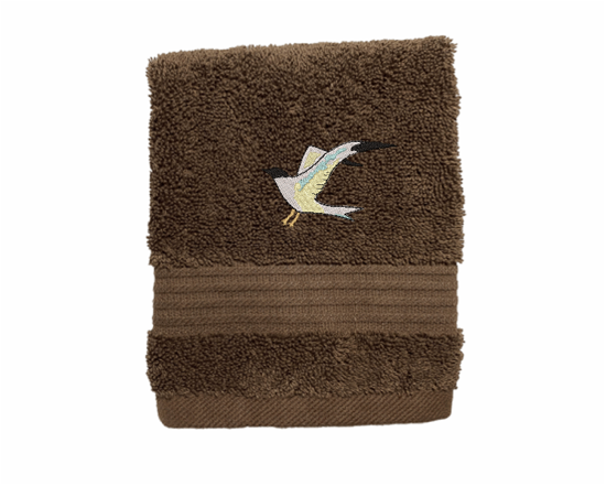 Brown High Quality Luxury Turkish washcloth, durable soft and absorbent, finished edges with a decorative band. Set has 1 bath towel 27" x 50", 1 hand towel 16' x 27", 1 washcloth 13" x 13". Embroidered with a custom design. You can personalize the towel set with a name and an initial on the washcloth or just the designs. These luxury towels will make a wonderful wedding gift, housewarming gift, or for your own bathroom decor. Borgmanns Creation