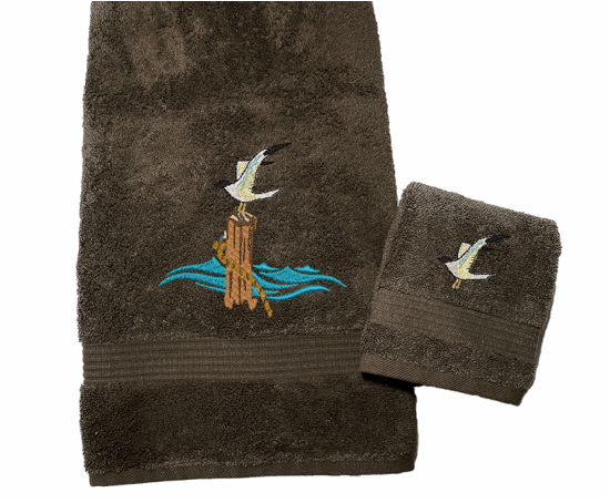 Brown High Quality Luxury Turkish Bath Towel and Washcloth, durable soft and absorbent, finished edges with a decorative band. Set has 1 bath towel 27" x 50", 1 hand towel 16' x 27", 1 washcloth 13" x 13". Embroidered with a custom design. You can personalize the towel set with a name and an initial on the washcloth or just the designs. These luxury towels will make a wonderful wedding gift, housewarming gift, or for your own bathroom decor. Borgmanns Creation