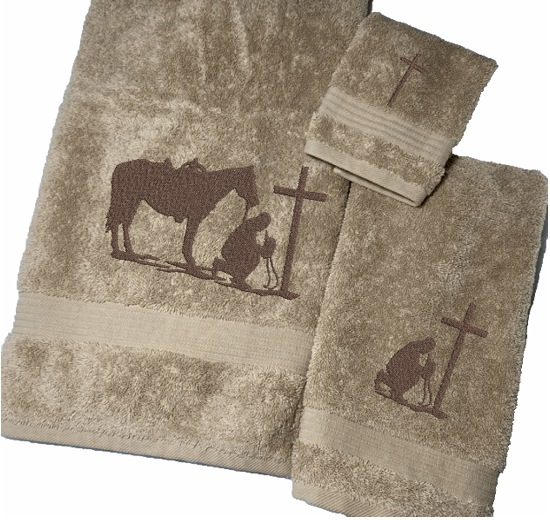 Beige bath towel set or individual towels, embroidered cowboy praying design, the perfect design for that farmhouse decor. This towel set has 3 towels 1 bath towel 27" x 55", 1 hand towel 16" x 27", 1 wash cloth 13" x 13". You can personalize the towel set with a name and an initial on the wash cloth - Borgmanns Creations