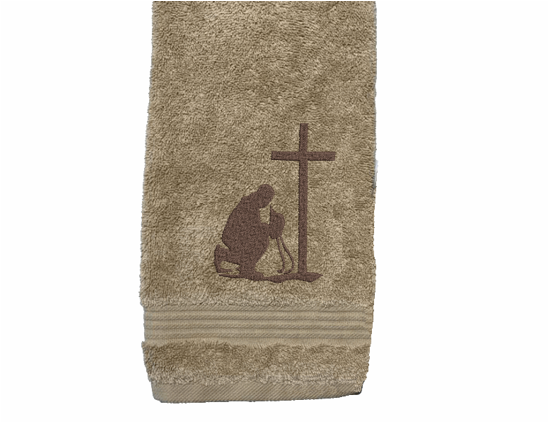 Beige hand towel, embroidered cowboy praying design, the perfect design for that farmhouse decor. This towel set has 3 towels 1 bath towel 27" x 55", 1 hand towel 16" x 27", 1 wash cloth 13" x 13". You can personalize the towel set with a name and an initial on the wash cloth - Borgmanns Creations