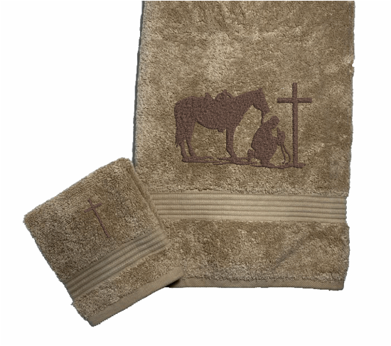 Beige bath towel and washcloth, embroidered cowboy praying design, the perfect design for that farmhouse decor. This towel set has 3 towels 1 bath towel 27" x 55", 1 hand towel 16" x 27", 1 wash cloth 13" x 13". You can personalize the towel set with a name and an initial on the wash cloth - Borgmanns Creations