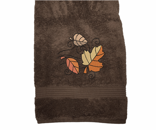 Brown bath towel Fall leaves is the perfect design for the country living family, that likes the outdoor life, for that farmhouse decor. This Luxury western theme towel set of 3 towels 1 bath towel 27" x 55", 1 hand towel 16" x 27", 1 wash cloth 13" x 13". You can personalize the towel set with a name and an initial on the wash cloth or just the designs. Borgmanns Creations