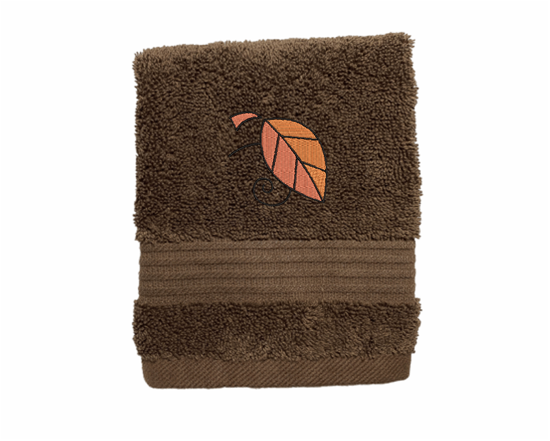 Brown washcloth, Fall leaves is the perfect design for the country living family, that likes the outdoor life, for that farmhouse decor. This Luxury western theme towel set of 3 towels 1 bath towel 27" x 55", 1 hand towel 16" x 27", 1 wash cloth 13" x 13". You can personalize the towel set with a name and an initial on the wash cloth or just the designs. Borgmanns Creations