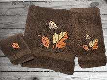 Load image into Gallery viewer, Brown bath towel set or individual towels, Fall leaves is the perfect design for the country living family home  decor. This Luxury Turkish western theme towel set of  3 towels 1 bath towel 27&quot; x 55&quot;, 1 hand towel 15&quot; x 28&quot;, 1 wash cloth 13&quot; x 13&quot;. Personalize the towel set with a name and an initial on the wash cloth Borgmanns Creations -2
