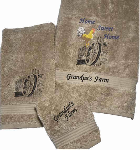 High Quality Luxury beige towels durable soft and absorbent, finished edges with a decorative band. Set has 1 bath towel 27" x 50", 1 hand towel 16" x 27", 1 washcloth 13" x 13". Embroidered with a custom design. You can personalize the towel set with a name and an initial on the washcloth or just the designs. These luxury towels will make a wonderful wedding gift, housewarming gift, or for your own bathroom decor.. Borgmanns Creations