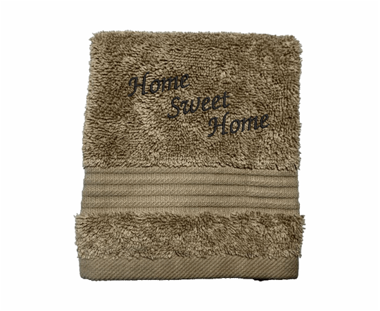 High Quality Luxury beige washcloth  durable soft and absorbent, finished edges with a decorative band. Set has 1 bath towel 27" x 50", 1 hand towel 16" x 27", 1 washcloth 13" x 13". Embroidered with a custom design. You can personalize the towel set with a name and an initial on the washcloth or just the designs. These luxury towels will make a wonderful wedding gift, housewarming gift, or for your own bathroom decor.. Borgmanns Creations