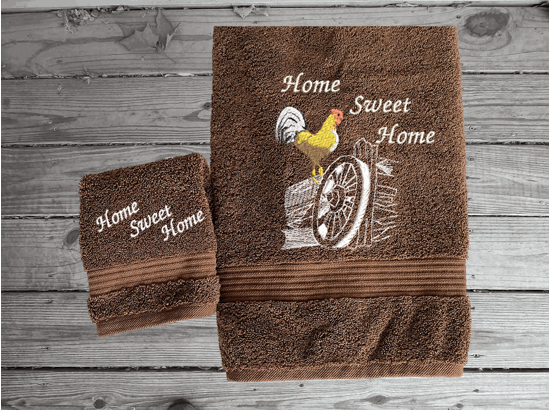 Brown bath towel and washcloth, this rooster design is the perfect design for the country living family, that likes the outdoor life, for that farmhouse decor. This Luxury western theme towel set of set has 3 towels 1 bath towel 27" x 50", 1 hand towel 16" x 27", 1 wash cloth 13" x 13". You can personalize the towel set with a name and an initial on the wash cloth or just the designs - Borgmanns Creation