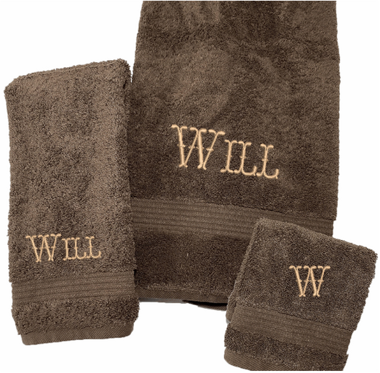 High Quality Luxury Turkish Brown Towels durable soft and absorbent, finished edges with a decorative band. Set has 1 bath towel 27 x50", 1 hand towel 15" x 27", 1 washcloth 13" x 13. Embroidered with a custom name,  an initial on the washcloth. These luxury towels will make a wonderful wedding gift, housewarming gift, or for your own bathroom decor. Borgmanns Creations