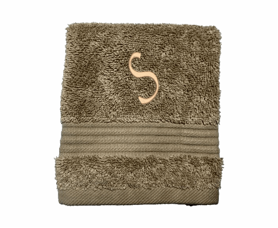 Personalized luxury beige washcloth, set has 3 towels 1 bath towel 27" x 50", 1 hand towel 15: x 27", 1 wash cloth 13" x 13. You can personalize the towel set with embroidered name for that special wedding gift or housewarming gift. Borgmanns Creations