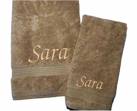 Personalized luxury beige hand towel and washcloth, set has 3 towels 1 bath towel 27" x 50", 1 hand towel 15: x 27", 1 wash cloth 13" x 13. You can personalize the towel set with embroidered name for that special wedding gift or housewarming gift. Borgmanns Creations