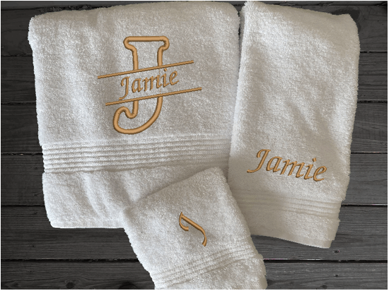 White personalized bath towels with embroidered monogram initial an name. Soft absorbent towels, set is 1 bath towel - 27" x 50", 1  hand towel 16" x 27", 1 wash cloth - 13" x 13", a gift for anyone in the family or a gift for a friend. Monogram towels for that special wedding gift. Borgmanns Creations