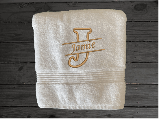 White personalized baath towel with embroidered monogram initial an name. Soft absorbent towels, set is 1 bath towel - 27" x 50", 1  hand towel 16" x 27", 1 wash cloth - 13" x 13", a gift for anyone in the family or a gift for a friend. Monogram towels for that special wedding gift. Borgmanns Creations