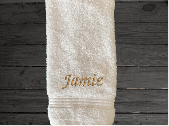 White personalized hand towel with embroidered monogram initial an name. Soft absorbent towels, set is 1 bath towel - 27" x 50", 1  hand towel 16" x 27", 1 wash cloth - 13" x 13", a gift for anyone in the family or a gift for a friend. Monogram towels for that special wedding gift. Borgmanns Creations