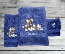 Load image into Gallery viewer, Blue bath towel set or individual towels, cowboy hat and boots is the perfect design for that farmhouse decor. This Luxury Turkish towel set has 3 towels 1 bath towel 27&quot;x55&quot;, 1 hand towel 15&quot;x28&quot;, 1 wash cloth 13&#39;x13&quot;. Personalize the towel set with a name and an initial on the wash cloth or just the designs. Borgmanns Creations -1
