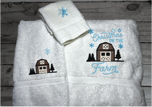 Load image into Gallery viewer, White bath towel set, or individual towels, embroidered design of a barn at Christmas time is perfect for the country living family, for that farmhouse decor. This Luxury soft and absorbent Christmas theme towel set of 3 towels 1 bath towel 27&quot; x50&quot;, 1 hand towel 16&quot; x 27&quot;, 1 wash cloth 13&quot; x 13&quot;. Borgmanns Creations 1
