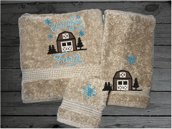 Beige bath towel set, or individual towels embroidered design of a barn at Christmas time is perfect for for that farmhouse decor. This Luxury soft and absorbent bathroom towel set of 3 towels 1 bath towel 27