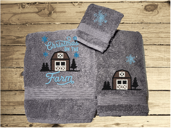 Gray bath towel set, or individual towels embroidered design of a barn at Christmas time is perfect for the country living family, for that farmhouse decor. This Luxury soft and absorbent western theme towel set of 3 towels 1 bath towel 27" x 50", 1 hand towel 16" x27", 1 wash cloth 13" x 13".  Borgmanns Creations 1