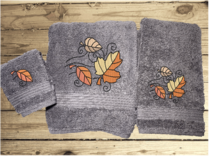Gray bath towel set or individual towels, Luxury Turkish towels embroidered with Fall leaves gives an outdoor feeling for your bathroom decor. Luxury towels 1 bath towel 27" x 50", 1 hand towel 16" x 27", 1 wash cloth 13" x 13". You can personalize the towel set with a name and an initial on the washcloth or just the designs. Borgmanns Creations 1