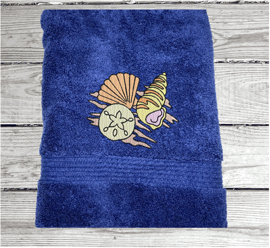 Bue High Quality Luxury Turkish bath towel, durable soft and absorbent, finished edges with a decorative band. Set has 1 bath towel 27" x 50", 1 hand towel 16" x 27", 1 washcloth 13" x 13". Embroidered with custom sea shells design. You can personalize the towel set with a name and an initial on the washcloth or just the designs. These luxury towels will make a wonderful wedding gift, housewarming gift, or for your own bathroom decor. Borgmanns Creations