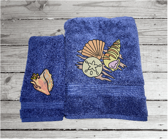 Bue High Quality Luxury Turkish bath towel ans hand towel, durable soft and absorbent, finished edges with a decorative band. Set has 1 bath towel 27" x 50", 1 hand towel 16" x 27", 1 washcloth 13" x 13". Embroidered with custom sea shells design. You can personalize the towel set with a name and an initial on the washcloth or just the designs. These luxury towels will make a wonderful wedding gift, housewarming gift, or for your own bathroom decor. Borgmanns Creations