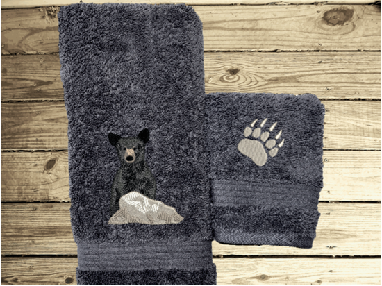 Gray hand and washcloth towel set, embroidered bear design the perfect design for the outdoor living family. This Luxury theme towel set of 3 towels 1 bath towel 27" x 50", 1 hand towel 16" x 27", 1 wash cloth 13" x 13". You can personalize the towel set with a name and name on the washcloth or just designs. Borgmanns Creations