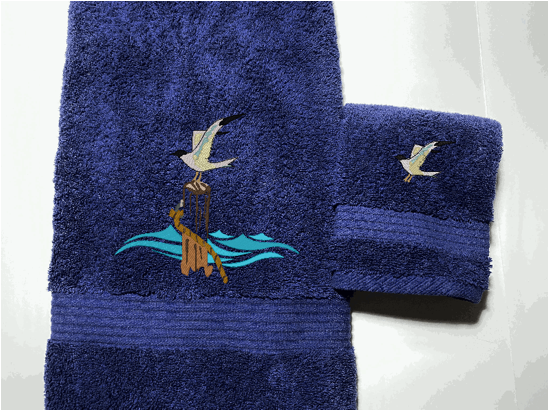 Blue High Quality Luxury Turkish Bath Towel and washcloth, durable soft and absorbent, finished edges with a decorative band. Set has 1 bath towel 27" x 50", 1 hand towel 16' x 27", 1 washcloth 13" x 13". Embroidered with a custom design. You can personalize the towel set with a name and an initial on the washcloth or just the designs. These luxury towels will make a wonderful wedding gift, housewarming gift, or for your own bathroom decor. Borgmanns Creations