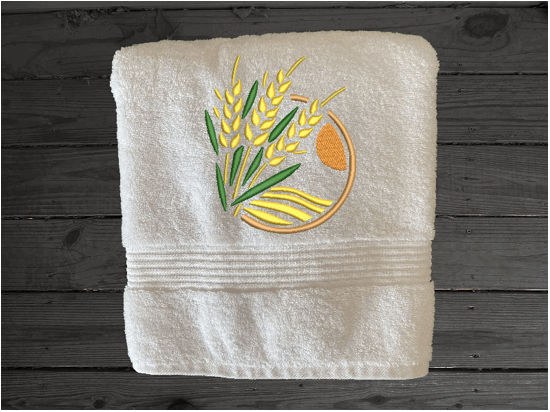 White bath towel , wheat design is the perfect design for the country living family, that likes the outdoor life, for that farmhouse decor. This Luxury farmhouse theme towel set has 3 towels 1 bath towel 17' x 50", 1 hand towel 16" x 27", 1 wash cloth 13" x 13". You can personalize the towel set with a name and an initial on the wash cloth or just the designs. Borgmanns Creations