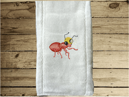 This is a try fold diaper with an embroidered bug one of a set of 3 in this burp cloth set. This can be personalized for the new born baby shower gift for the mom to be. Borgmanns Creations - 3