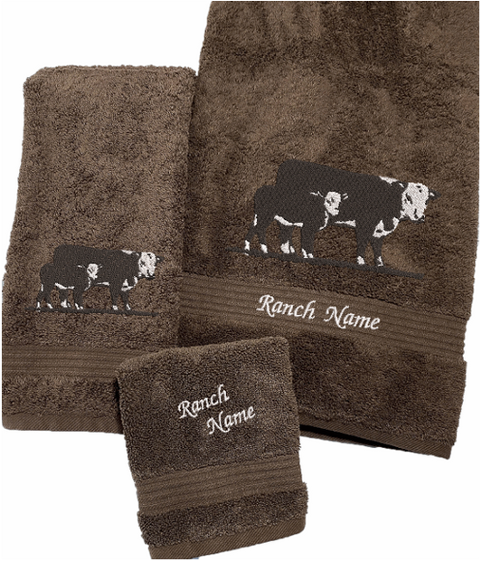 Brown bath towel set Hereford Cow design - ranch name embroidered - western living family- farmhouse decor - luxury western theme towel set of 3 towels 1 bath towel 27: x 50", 1 hand towel 16" x 27", 1 wash cloth  13" x 13"- personalize towel set with name and an initial on the wash cloth or leave it plain - Borgmanns Creations