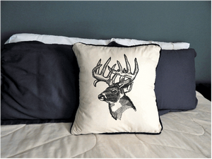 Deer head embroidered design in black throw pillow cover, 18" x 18" beige (natural color) with matching piping around edge. The perfect decor for farmhouse or country living. A gift for the deer hunters to place in there room, anniversary gift, birthday gift or housewarming gift for a best friend gift. Borgmanns Creations  3