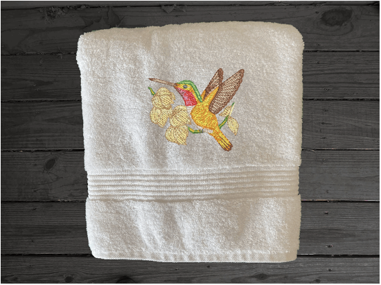 Luxury bath towel, embroidered hummingbird is the perfect design for the Spring/Summer look. This Luxury towel set of 3 towels 1 bath towel 27" x 50", 1 hand towel 16" x 27", 1 wash cloth 13" x 13". You can personalize the bath towel with a name. Borgmanns Creations