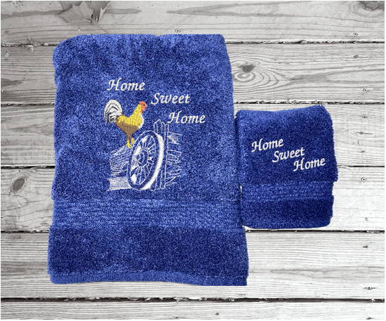 High Quality Luxury blue turkish bath towel and wshcloth, durable soft and absorbent, finished edges with a decorative band. Set has 1 bath towel 27" x 50", 1 hand towel 16" x 27", 1 washcloth 13" x 13". Embroidered with a custom design. You can personalize the towel set with a name and an initial on the washcloth or just the designs. These luxury towels will make a wonderful wedding gift, housewarming gift, or for your own bathroom decor. Borgmanns Creations