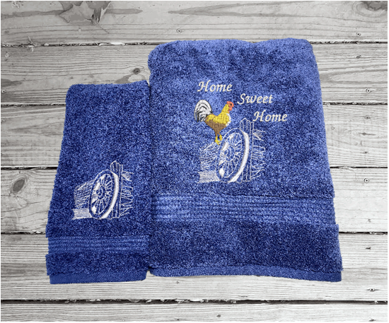 High Quality Luxury blue turkish bath towel and hand towel, durable soft and absorbent, finished edges with a decorative band. Set has 1 bath towel 27" x 50", 1 hand towel 16" x 27", 1 washcloth 13" x 13". Embroidered with a custom design. You can personalize the towel set with a name and an initial on the washcloth or just the designs. These luxury towels will make a wonderful wedding gift, housewarming gift, or for your own bathroom decor. Borgmanns Creations