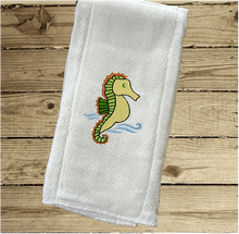 Load image into Gallery viewer, Try fold diaper with embroidered seahorse .This diaper burp cloth is one of 3 embroidered fish designs in the set, would be the perfect girl of boy baby shower gift for one who likes to be around the water, decorative diaper. New born burp cloth a gift for mom to be with personalized name. Makes a useful gift for any meal of the day or to keep handy through the whole day. Borgmanns Creations - 3

