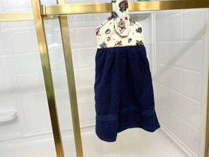 Blue terry towel over all size of 21 inches, the top has batting between layers of garden bees and flowers cotton material and a button for fastening on oven handle, drawer handle, icebox, shower bar or bathroom hanger. A wonderful way to have a towel handy at all times.  This item is ready to ship. - Borgmanns Creations - 8