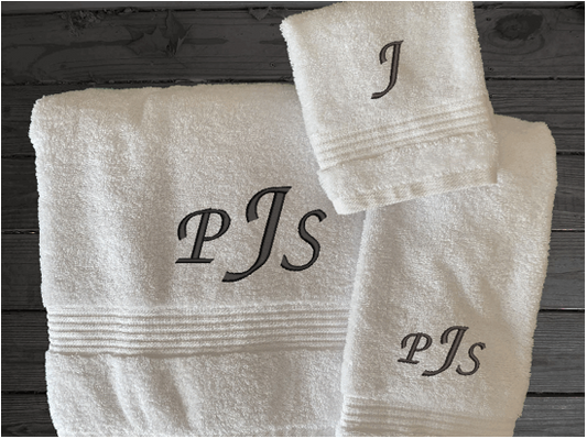 White personalized luxury bath towels with embroidered monogram initials. Luxury towels 1 bath towel 27" x 50", 1 hand towel 16" x 27", 1 washcloth 13" x 13", soft and absorbent with decorative band, bathroom decor. Soft absorbent bath towels, a gift for anyone in the family or a gift for a friend. Monogram name for that special wedding gift. Borgmanns Creations
