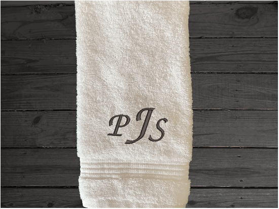 White personalized luxury hand towels with embroidered monogram initials. Luxury towels 1 bath towel 27" x 50", 1 hand towel 16" x 27", 1 washcloth 13" x 13", soft and absorbent with decorative band, bathroom decor. Soft absorbent bath towels, a gift for anyone in the family or a gift for a friend. Monogram name for that special wedding gift. Borgmanns Creations