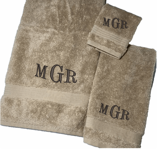 Personalized luxury soft and absorbent beige bath towel set has 3 towels 1 bath towel 27" x 50", 1 hand towel 16" x 27" wash cloth13" x 13". You can order the towel separately, personalize the bath towel with 3 embroidered initial for that special wedding gift, anniversary gift or home decor housewarming gift. - Borgmanns Creations