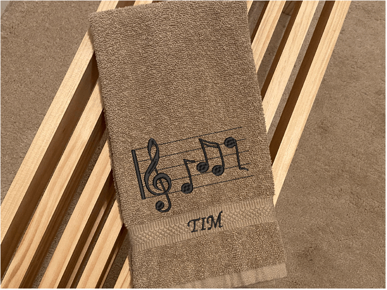 Beige musical notes hand towel - cotton premium terry towel, soft and absorbent, 16" x 27"  embroidered musical notes and the towel can be a personaloized gift for mom and her music minded family - teachers band members etc. - bathroom or kitchen decor -- Borgmanns Creations