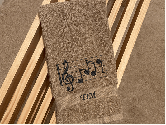 Beige musical notes hand towel - cotton premium terry towel, soft and absorbent, 16" x 27"  embroidered musical notes and the towel can be a personaloized gift for mom and her music minded family - teachers band members etc. - bathroom or kitchen decor -- Borgmanns Creations