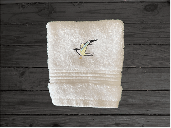White High Quality Luxury Turkish washcloth, durable soft and absorbent, finished edges with a decorative band. Set has 1 bath towel 27" x 50", 1 hand towel 16" x 27", 1 washcloth 13" x 13". Embroidered with a custom sea gull design. You can personalize the towel set with a name and an initial on the washcloth or just the designs. These luxury towels will make a wonderful wedding gift, housewarming gift, or for your own bathroom decor. Borgmanns Creations