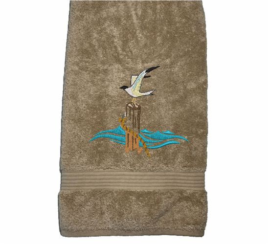 Beige High Quality Luxury Turkish Bath Towel, durable soft and absorbent, finished edges with a decorative band. Set has 1 bath towel 27" x 50", 1 hand towel 16" x 27", 1 washcloth 13" x 13". Embroidered with a custom design. You can personalize the towel set with a name and an initial on the washcloth or just the designs. These luxury towels will make a wonderful wedding gift, housewarming gift, or for your own bathroom decor. Borgmanns Creations