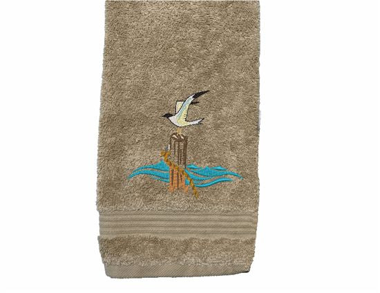 Beige High Quality Luxury Turkish and Towel, durable soft and absorbent, finished edges with a decorative band. Set has 1 bath towel 27" x 50", 1 hand towel 16" x 27", 1 washcloth 13" x 13". Embroidered with a custom design. You can personalize the towel set with a name and an initial on the washcloth or just the designs. These luxury towels will make a wonderful wedding gift, housewarming gift, or for your own bathroom decor. Borgmanns Creations