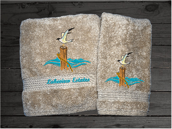 High Quality Luxury Turkish beige bath towel and hand towel, durable soft and absorbent, finished edges with a decorative band. Set has 1 bath towel 27" x 50", 1 hand towel 16" x 27", 1 washcloth 13" x 13". Embroidered with a custom sea gull on a post design. You can personalize the towel set with a name and an initial on the washcloth or just the designs. These luxury towels will make a wonderful wedding gift, housewarming gift, or for your own bathroom decor. Borgmanns Cretions