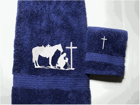 Blue bath towel and washcloth , embroidered cowboy praying design, the perfect design for that farmhouse decor. This towel set has 3 towels 1 bath towel 27" x 55", 1 hand towel 16" x 27", 1 wash cloth 13" x 13". You can personalize the towel set with a name and an initial, on the wash cloth - Borgmanns Creations 