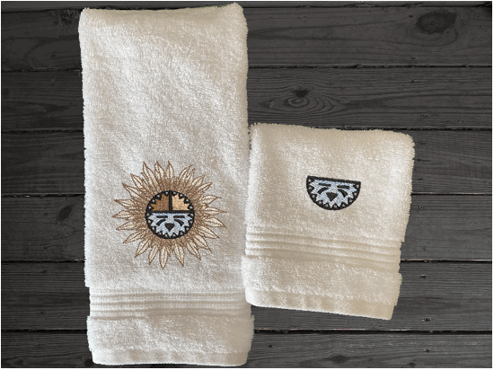 White hand towel and washcloth, embroidered Southwest Sun Symbol is the perfect design for the western living family, that farmhouse decor. This Luxury western theme towel set 3 towels 1 bath towel 27" x 50", 1 hand towel 16" x 27", 1 wash cloth 13" x 13". You can personalize the towel set with a name and an initial on the wash cloth or just the designs. Borgmanns Creations